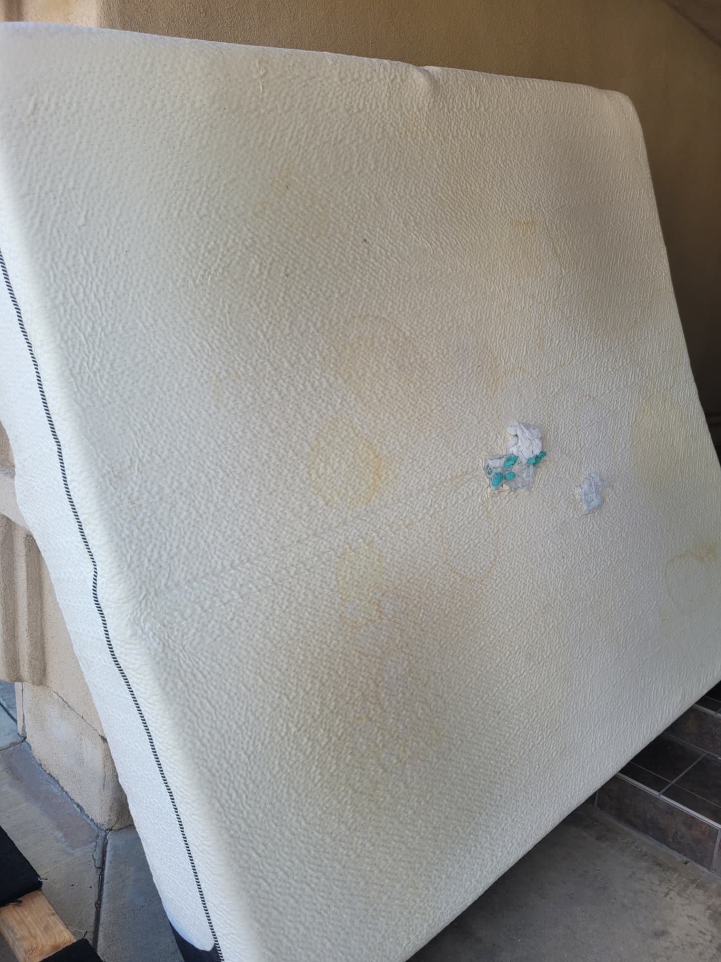 Porch before — old mattress
