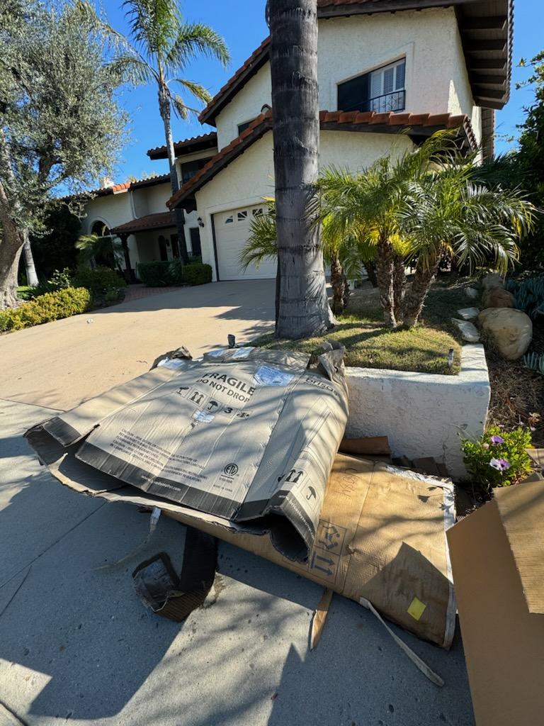 Driveway before — cardboard & packaging